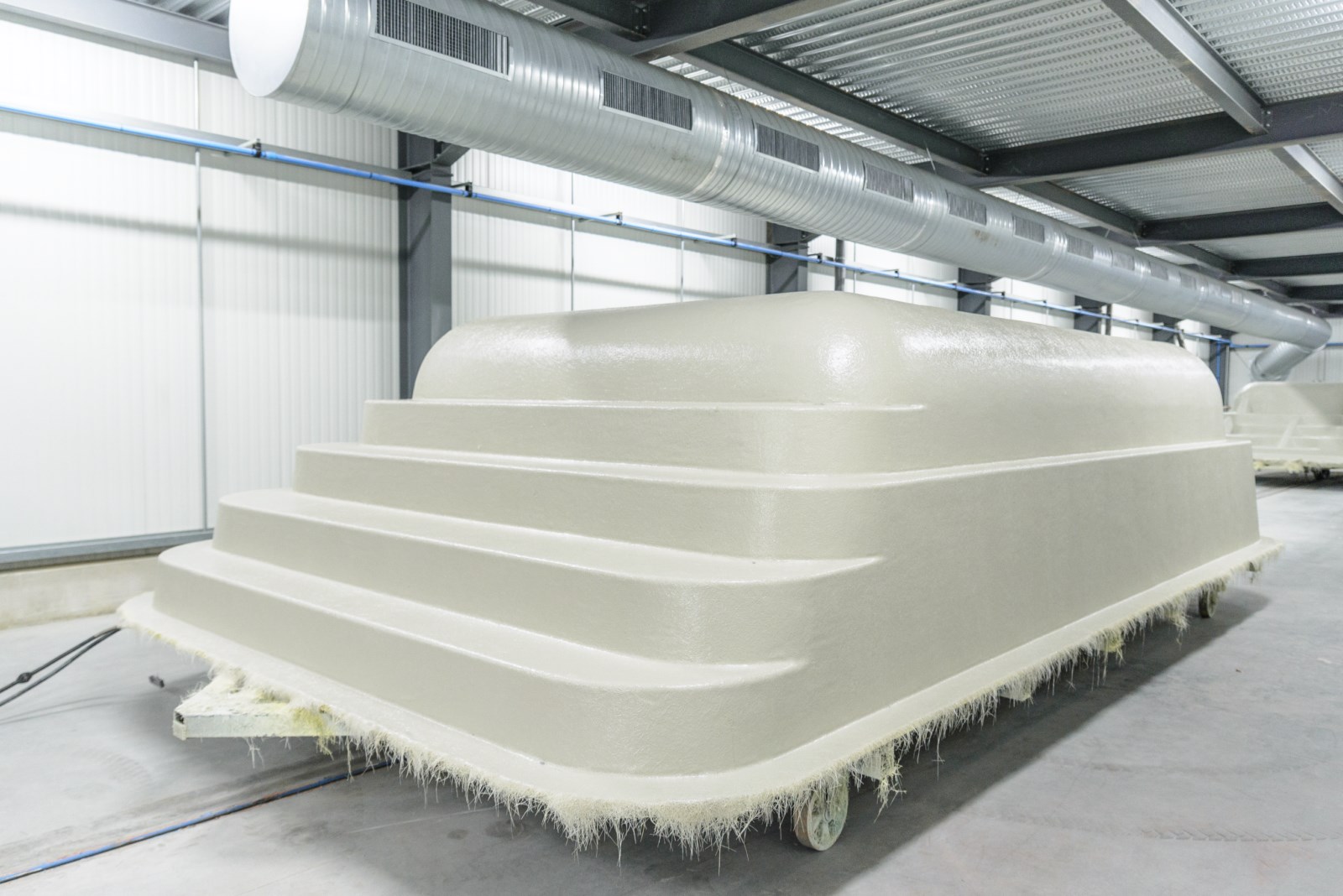 Etuve projection fibre sur piscine composites