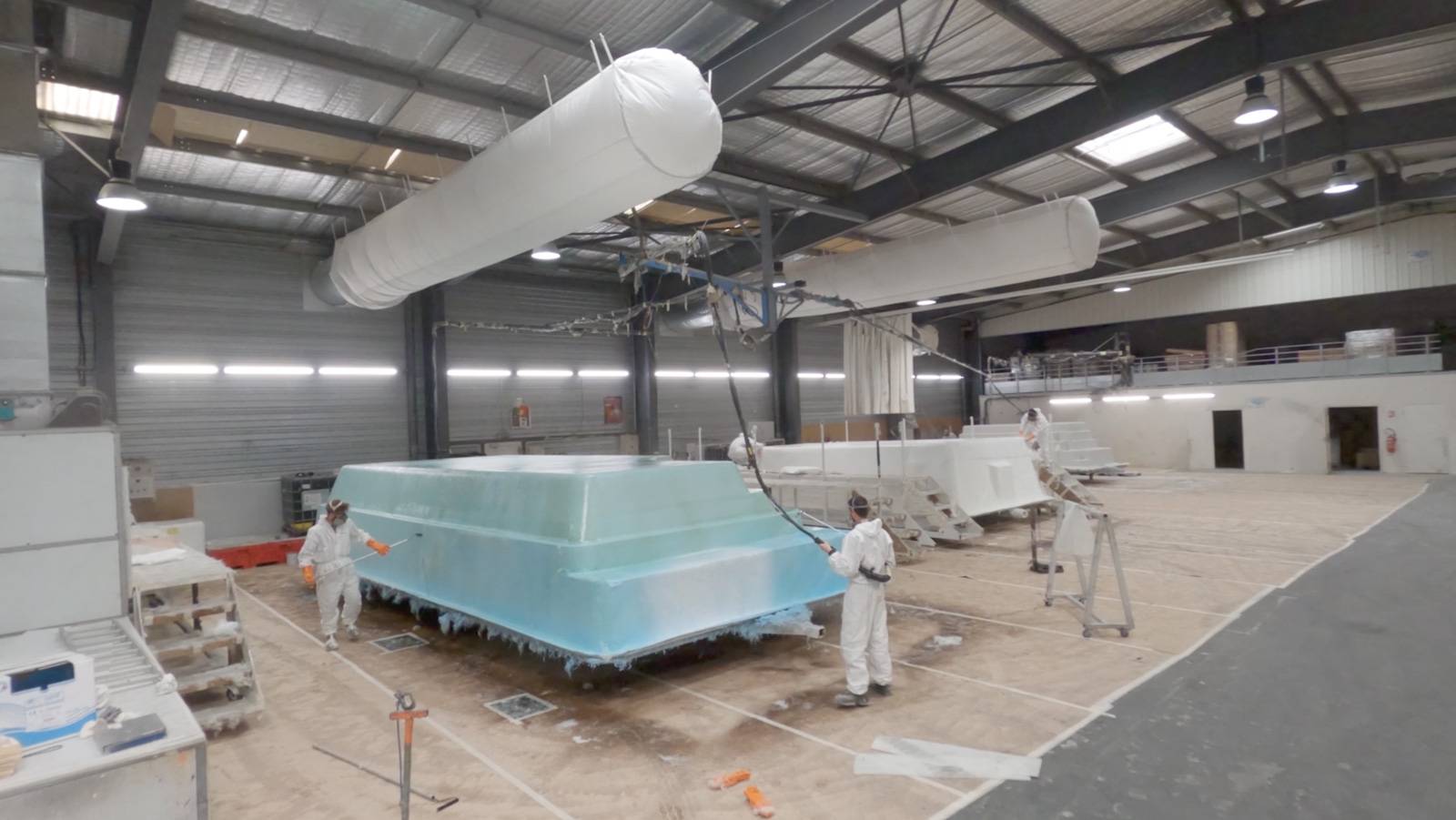 Projection simultanée de résine et fibre de verre